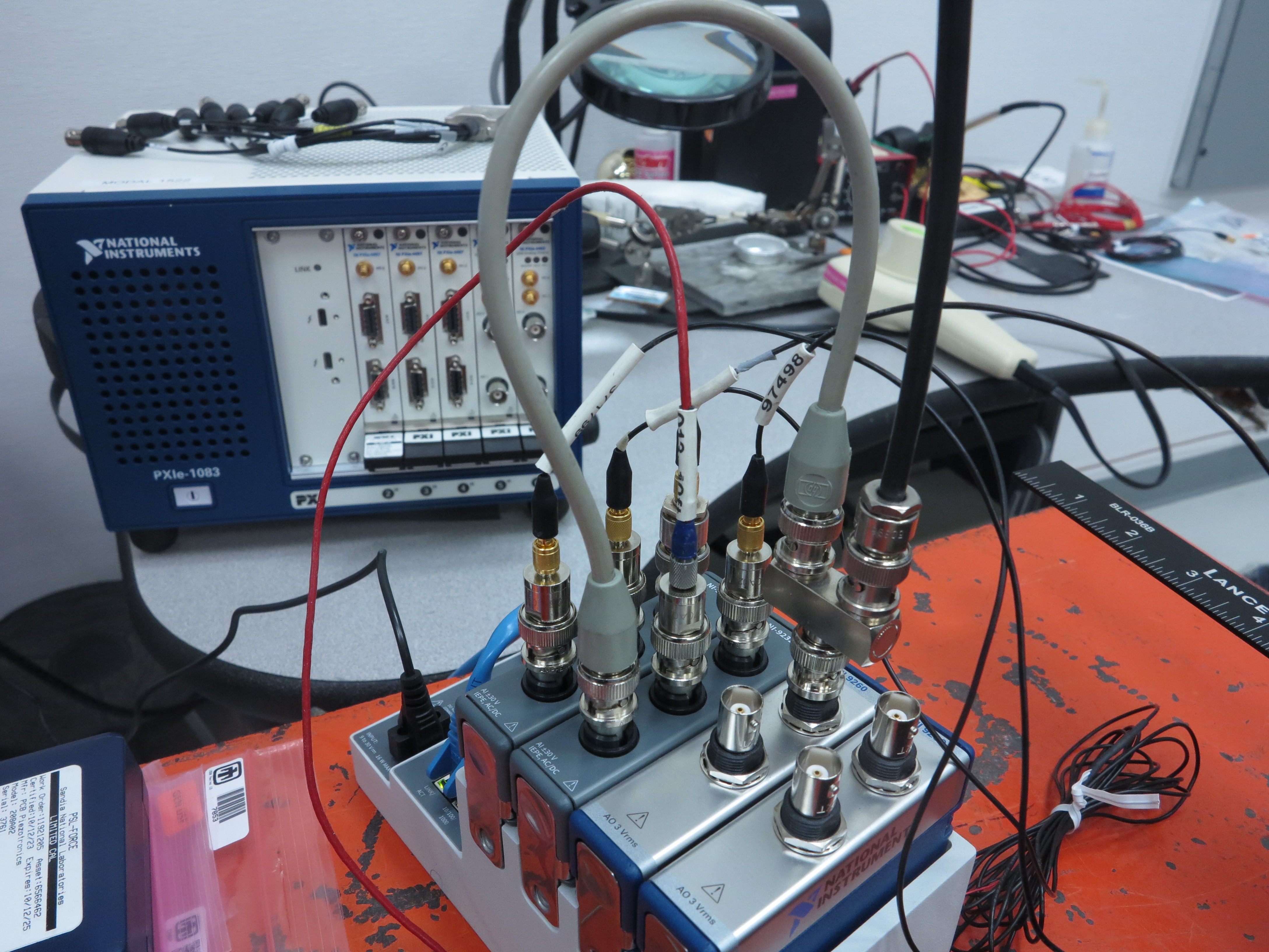 Data acquisition setup for the shaker test showing the shaker signal teed into the last acquisition channel.