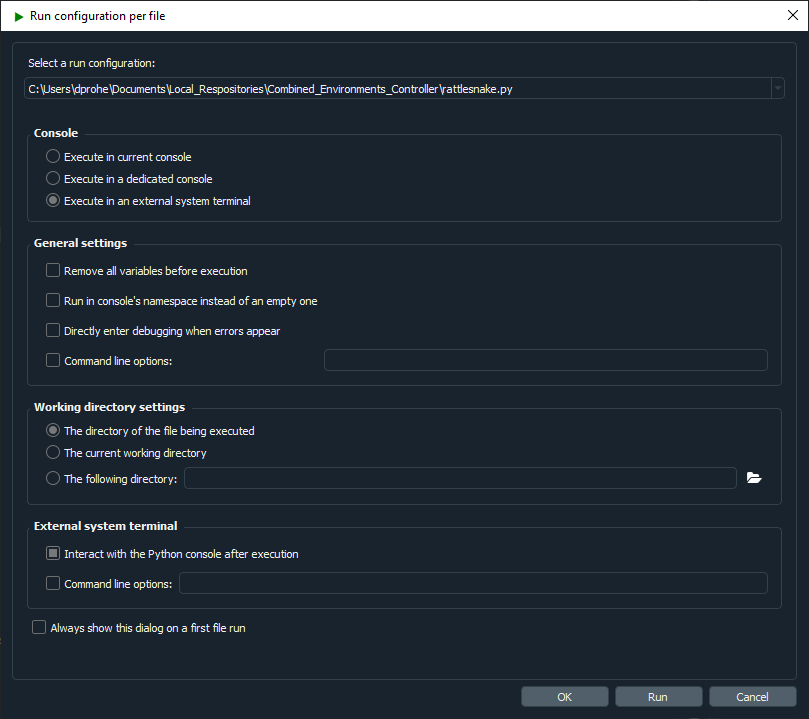Spyder run configuration showing execution in an external system terminal as well as allowing interaction with the Python console after execution.